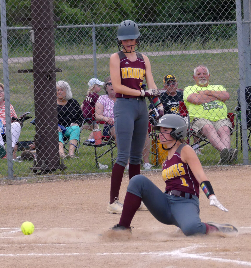 The softball travels from the backstop to greet Morgan Grooters as she arrives home. With no George-Little Rock players attached to the ball, Grooters was easily safe in the HMS win.
