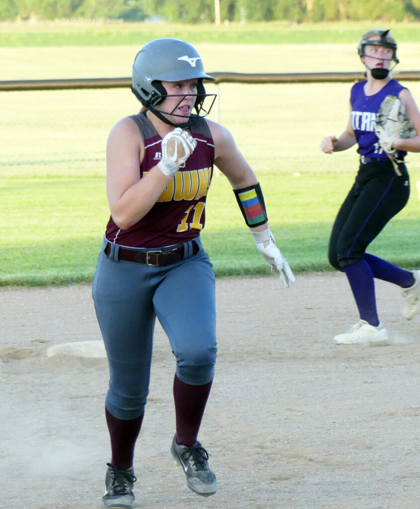 Frankie Mohni advances from second to third on a wild pitch by GTRA.