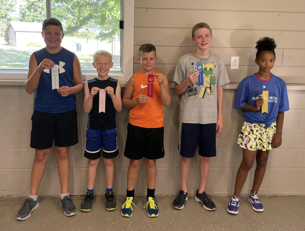 The top five finishers in the Sanborn Christian School 1 Mile Run are from left, Logan Minderhoud third place in 6:30, Easton Rozenboom fourth place in 7:20, Kaden Minderhoud second place in 5:50, Sawyer Meinders first place in 5:34 and Ashlyn Verrips fifth place in 9:23